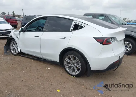 2023 Tesla Model Y Awd/Long Range Dual Motor All-Wheel Drive z USA, uszkodzony, nr VIN 7SAYGDEEXPF607886
